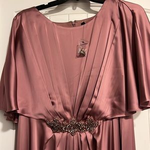 Be the bell of the ball in this vintage design dress with embellishments. NWOT